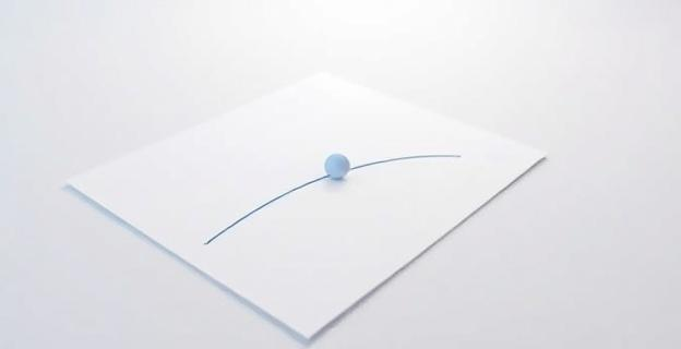 Imagen de una hoja de papel con un punto y una línea que comienza en ese punto, simbolizando el concepto de un punto inicial necesario para la creación del universo.