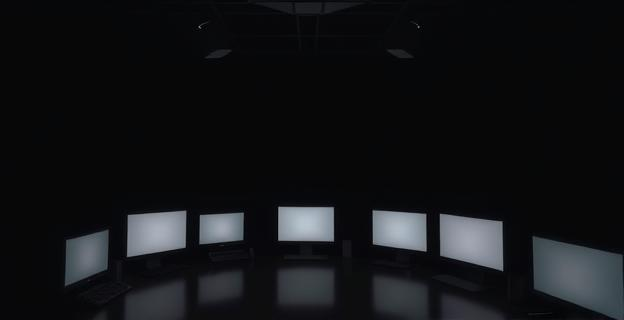 Una habitación oscura con múltiples pantallas encendidas, representando el aislamiento digital y la desconexión del mundo exterior.