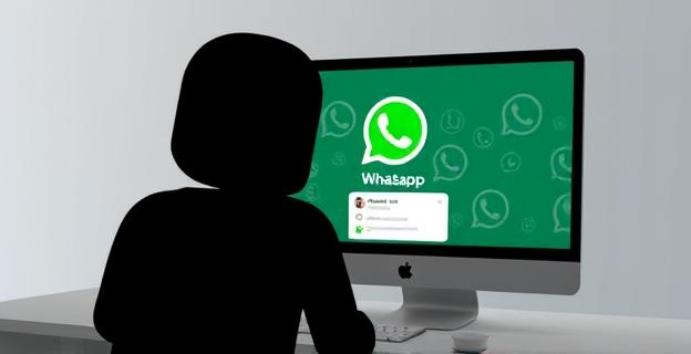 Una pantalla de ordenador mostrando una cuenta de WhatsApp siendo hackeada con una sombra oscura alrededor, representando el ciberataque GhostPairing